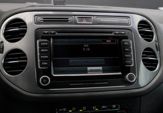 Подержанный автомобиль Volkswagen Tiguan 2013 года (13 фото)