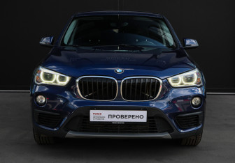 Подержанный автомобиль BMW X1 2015 года (2 фото)