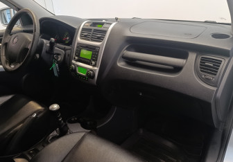 Подержанный автомобиль Kia Sportage 2009 года (7 фото)