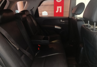Подержанный автомобиль Kia Sportage 2009 года (8 фото)