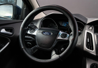 Подержанный автомобиль Ford Focus Hatchback 2015 года (11 фото)