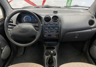 Подержанный автомобиль Daewoo Matiz 2011 года (14 фото)