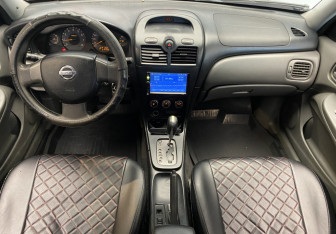 Подержанный автомобиль Nissan Almera Classic 2011 года (9 фото)