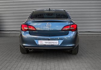Подержанный автомобиль Opel Astra Sedan 2014 года (5 фото)