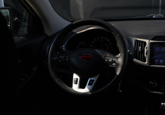 Подержанный автомобиль Kia Sportage 2011 года (11 фото)