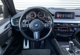 Подержанный автомобиль BMW X6 2017 года (14 фото)