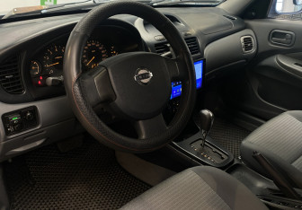 Подержанный автомобиль Nissan Almera Classic 2006 года (12 фото)