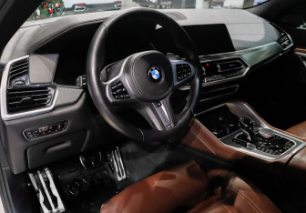Подержанный автомобиль BMW X6 2020 года (13 фото)