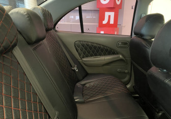 Подержанный автомобиль Nissan Almera Classic 2011 года (8 фото)