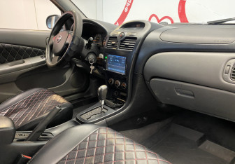 Подержанный автомобиль Nissan Almera Classic 2011 года (7 фото)