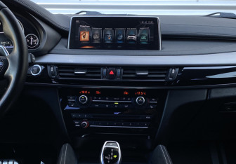 Подержанный автомобиль BMW X6 2017 года (12 фото)