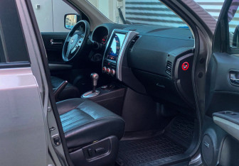 Подержанный автомобиль Nissan X-Trail 2012 года (7 фото)