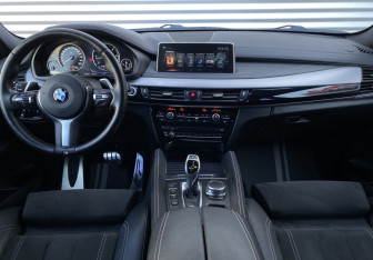 Подержанный автомобиль BMW X6 2017 года (13 фото)