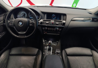 Подержанный автомобиль BMW X4 2016 года (11 фото)