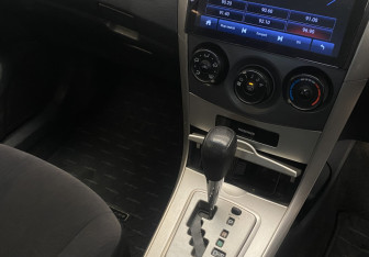 Подержанный автомобиль Toyota Corolla Wagon 2007 года (14 фото)