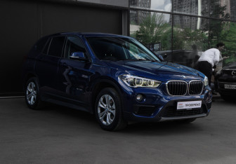 Подержанный автомобиль BMW X1 2015 года (3 фото)