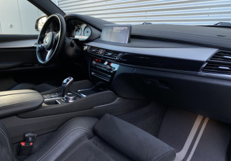 Подержанный автомобиль BMW X6 2017 года (9 фото)