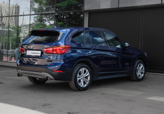 Подержанный автомобиль BMW X1 2015 года (4 фото)