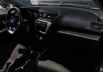 Подержанный автомобиль Kia Rio Hatchback 2013 года (7 фото)