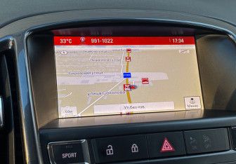 Подержанный автомобиль Opel Astra Sedan 2014 года (18 фото)