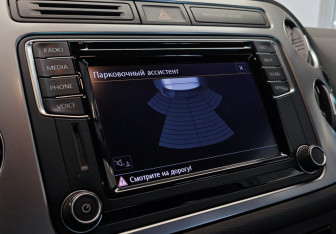 Подержанный автомобиль Volkswagen Tiguan 2016 года (12 фото)