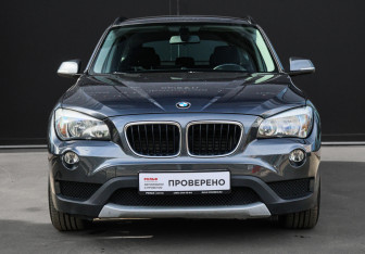 Подержанный автомобиль BMW X1 2013 года (2 фото)