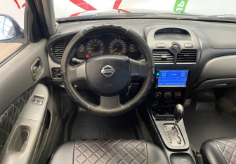Подержанный автомобиль Nissan Almera Classic 2011 года (10 фото)