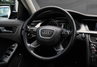 Подержанный автомобиль Audi A4 Sedan 2014 года (11 фото)