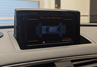 Подержанный автомобиль Audi Q3 2014 года (11 фото)