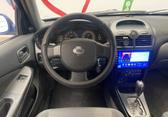 Подержанный автомобиль Nissan Almera Classic 2006 года (11 фото)