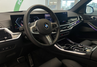 Подержанный автомобиль BMW X5 2025 года (19 фото)