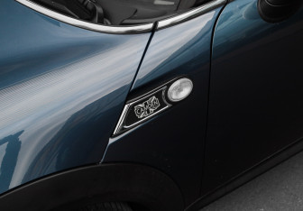 Подержанный автомобиль MINI Hatch 2009 года (24 фото)