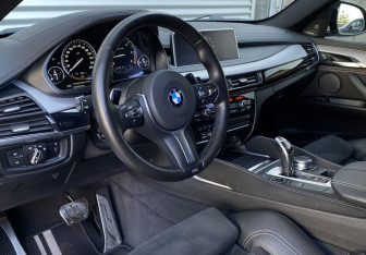 Подержанный автомобиль BMW X6 2017 года (18 фото)